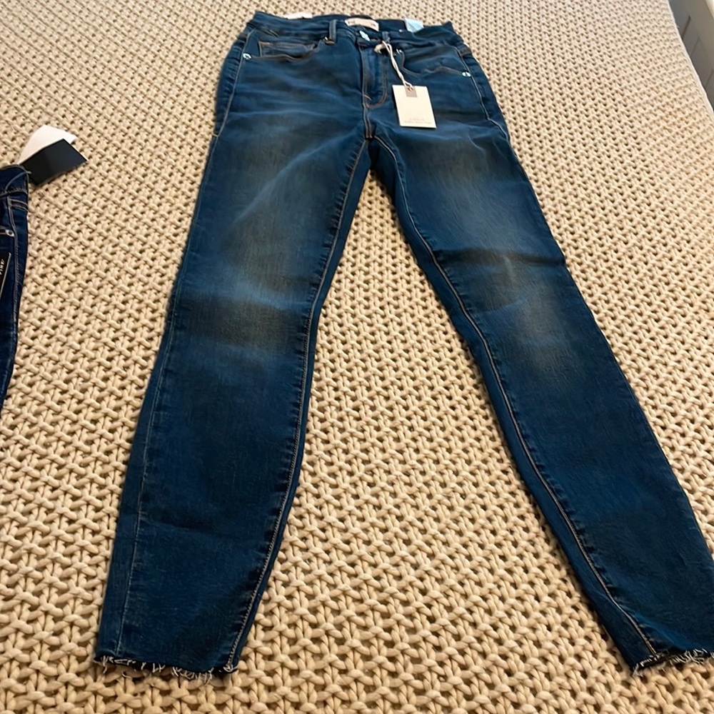 Waist nipping skinny high rise jean with flat tummy tech and gap proof waistband
